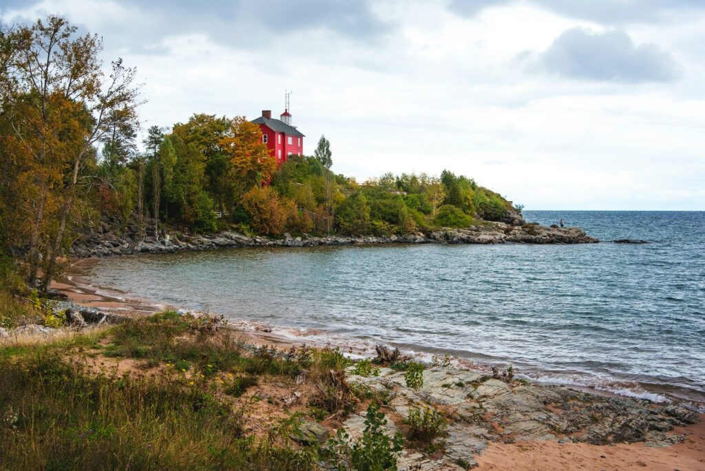 Red house by serene lakeside