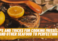 A chef skillfully cooking mussels, illustrating techniques from our comprehensive guide on cooking mussels and seafood.