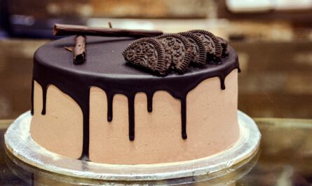 A delectable slice of Chocolate Cake in Singapore with rich, moist layers and luscious chocolate ganache.