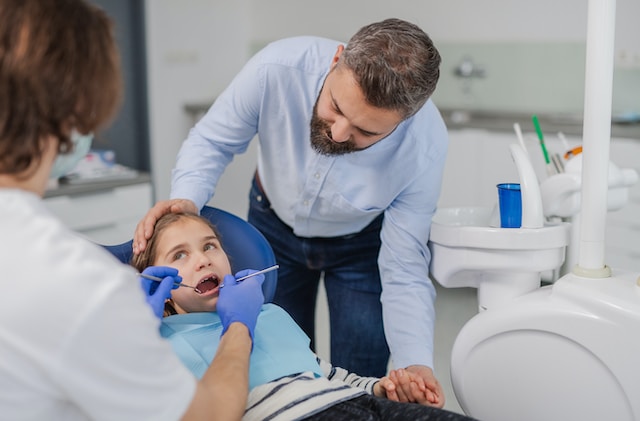 Parent with child at the dentist