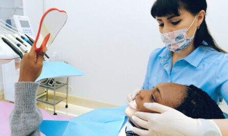 A person practicing Porcelain Veneers Care with proper dental hygiene tools.