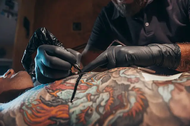 tattoo artist at work